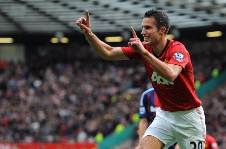 Striker Manchester United Robin van Persie merayakan golnya ke gawang Stoke City. AFP/ANDREW YATES 