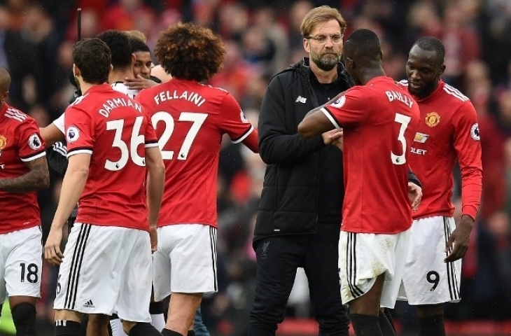 Manchester United mengalahkan Liverpool 2-1 di Old Trafford (AFP/OLI SCARFF)