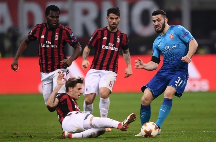 AC Milan akan kembali bertemu Arsenal dini hari nanti (AFP/MARCO BERTORELLO)