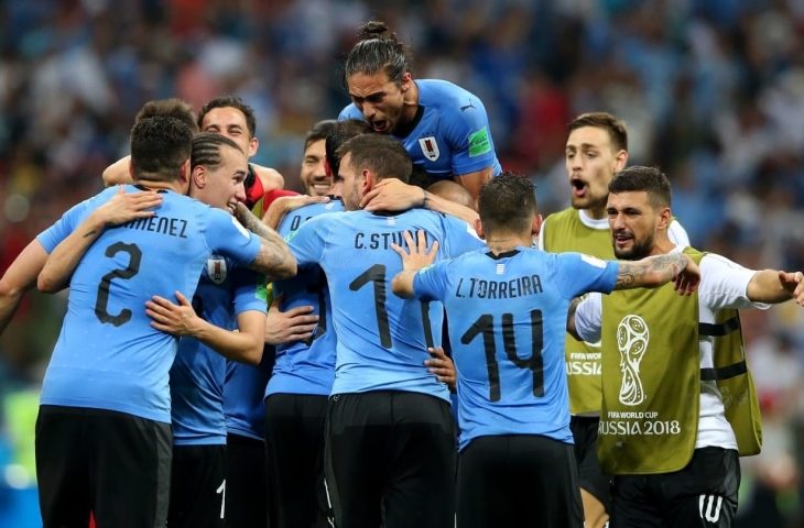 Selebrasi pemain Uruguay usai kandaskan Portugal pada babak 16 besar Piala Dunia 2018.