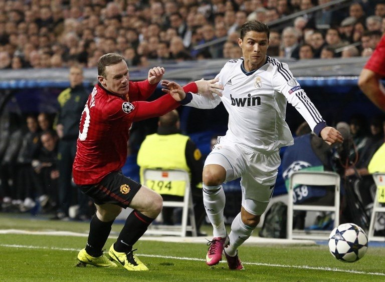 Pertemuan Wayne Roonye dan Cristiano Ronaldo di Liga Champions pada tahun 2013 (Cesar Manso/AFP)