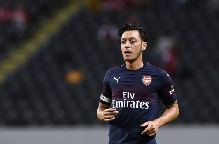 Gelandang Arsenal, Mesut Ozil (Jonathan Nackstrand/AFP)