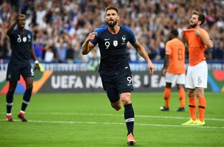 Pemain Timnas Prancis, Olivier Giroud saat merayakan gol ke gawang Belanda di ajang UEFA Nations League (AFP)