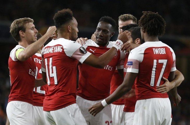 Para pemain Arsenal merayakan gol Dany Welbeck ke gawang Vorskla di Liga Europa pada 20 September 2018 (Ian Kington/AFP)