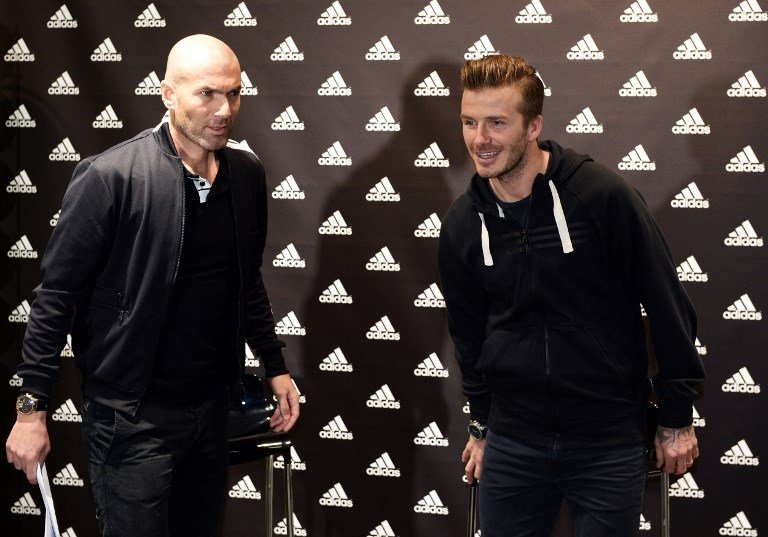 Zinedine Zidane (kiri) dan David Beckham (kanan) saat berjumpa di Paris dalam acara sponsor pada 28 Februari 2013 (Franck Fife/AFP)