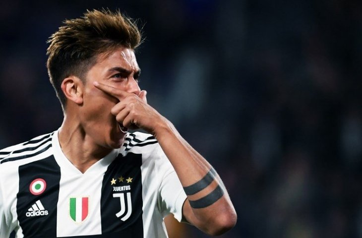 Selebrasi Paulo Dybala saat berhasil membobol gawang Bologna pada 26 September 2018 (Marco Bertorello/AFP)