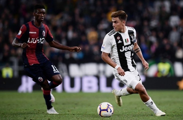 Aksi Paulo Dybala saat menghadapi Bologna pada 26 September 2018 (Marco Bertorello/AFP)