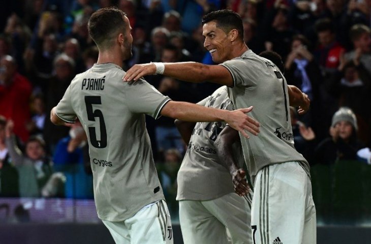 Pemainn Juventus merayakan gol Crisitano Ronaldo ke gawang Udinese pada 6 Oktober 2018 (Miguel Medina/AFP)