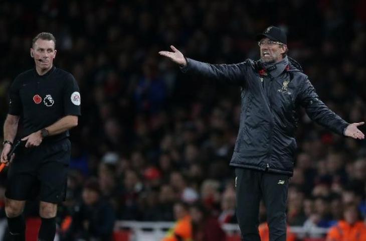 Reaksi pelatih Liverpool, Jurgen Klopp usai timnya ditahan imbang Arsenal dalam laga pekan ke-11 Liga Primer Inggris di Emirates Stadium, Minggu (4/11/2018). [DANIEL LEAL-OLIVAS / AFP]