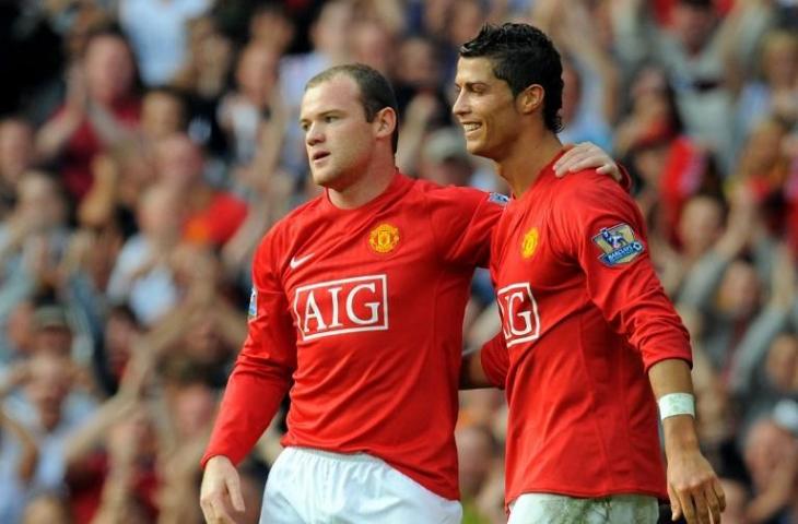 Wayne Rooney dan Cristiano Ronaldo saat masih bersama membela Manchester United (Andrew Yates/AFP)