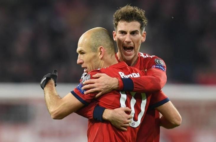 Selebrasi Arjen Robben kala menjebol gawang Benfica. (Christof Stache/AFP).