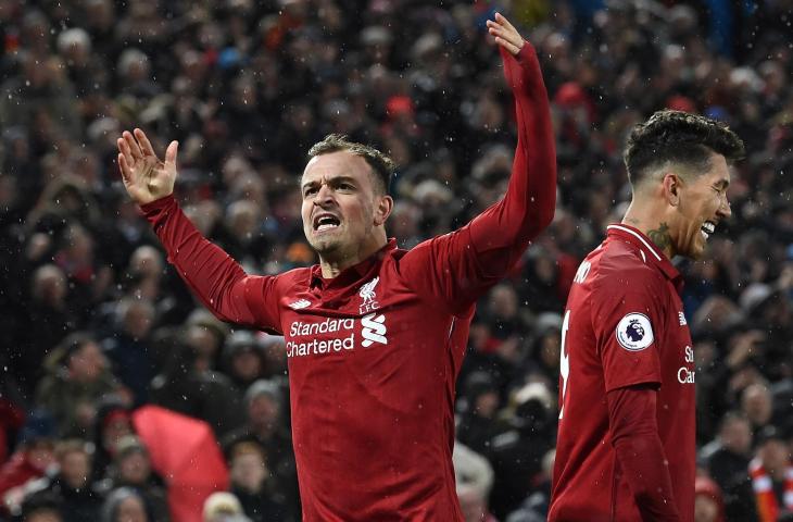 Pemain Liverpool, Xherdan Shaqiri merayakan gol ke gawang Manchester United di Stadion Anfield, Liverpool, Senin (17/12/2018)