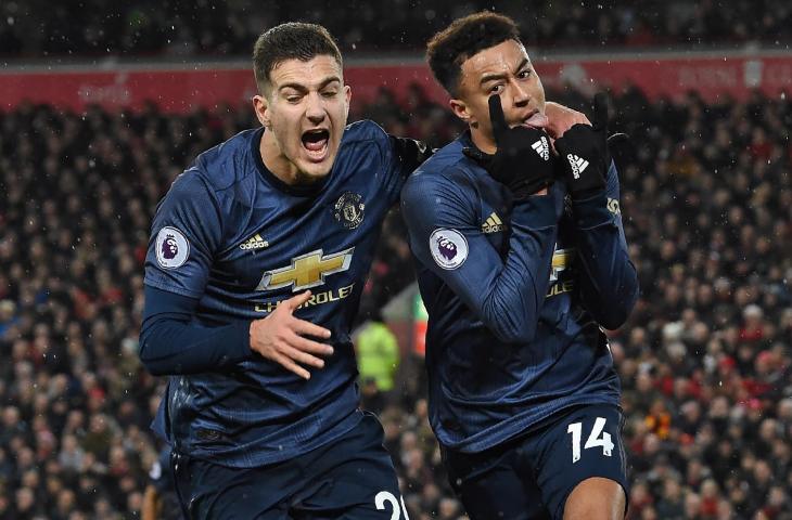 Pemain Manchester United, Jesse Lingard merayakan gol ke gawang Liverpool di Stadion Anfield, Liverpool, Senin (17/12/2018)