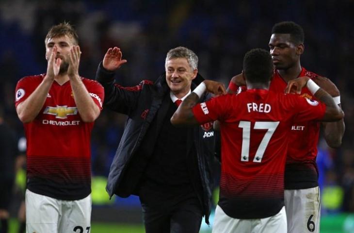 Pelatih sementara Manchester United, Ole Gunnar Solskjaer bersama para pemain setelah laga melawan Cardiff pada 22 Desember 2018 (Geoff Caddick/AFP)