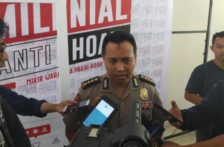 Kasubag Humas Tim Media, Satgas Antimafia Bola, Kombes Pol Syahar Diantono di Gedung UI. (Suara.com/Octa Morison)