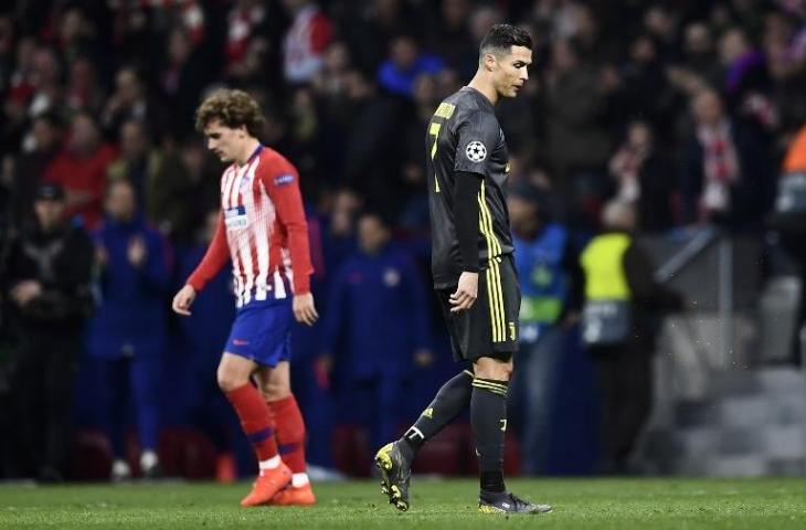 Ekspresi Cristiano Ronaldo dan Antoine Griezmann saat pertemuan mereka di Liga Champions pada 20 Februari 2019 (Oscar Del Pozo/AFP)