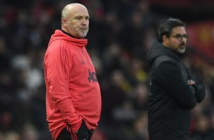 Asisten pelatih Manchester United, Mike Phelan (kiri). [Oli SCARFF / AFP]