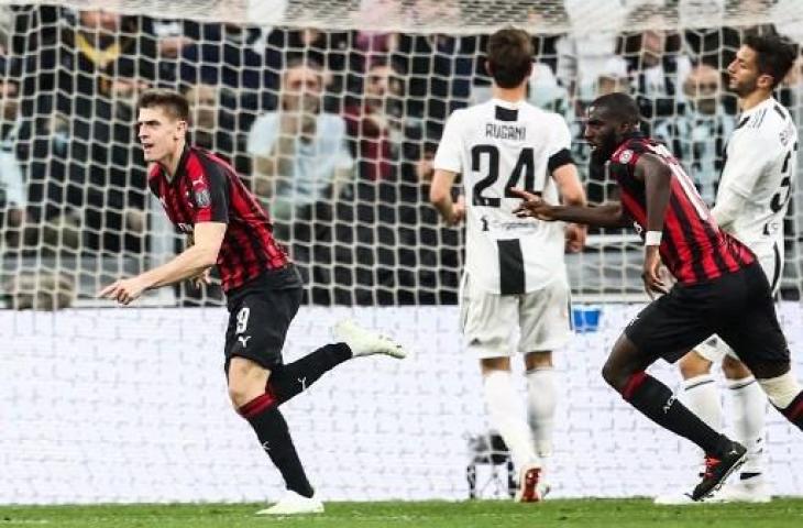 Krzysztof Piatek sukses membuka gol untuk AC Milan kala menghadapi Juventus, meski akhirnya harus kalah dengan skor 2-1. (ISABELLA BONOTTO / AFP)