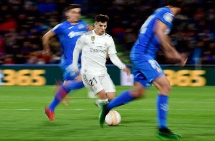 Aksi Brahim Diaz saat Real Madrid bertandang ke markas Getafe di Coliseum Alfonso Perez, Jumat (26/4/2019) dini hari WIB. (JAVIER SORIANO / AFP)