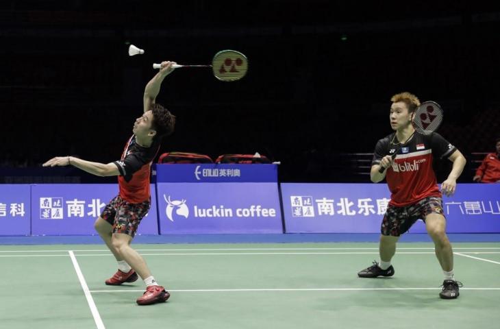 Kevin Sanjaya Sukamuljo dan Marcus Feraldi Gideon takluk atas ganda Jepang pada final Badminton Asia Championship (BAC) 2019, kemarin. [STR / AFP]