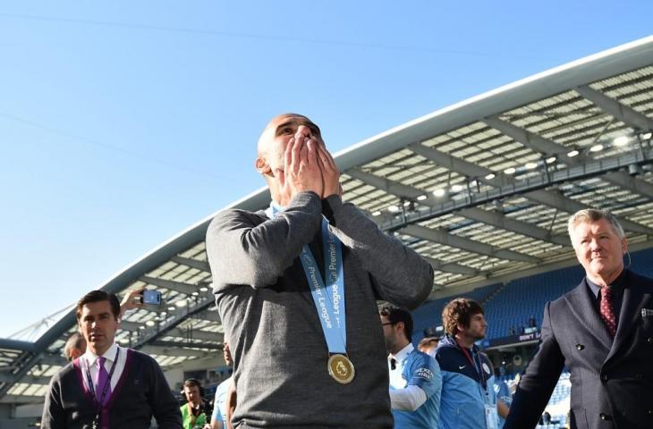 Reaksi manajer Manchester City, Pep Guardiola usai timnya sukses mempertahankan gelar Liga Primer Inggris musim ini. [GLYN KIRK / AFP]