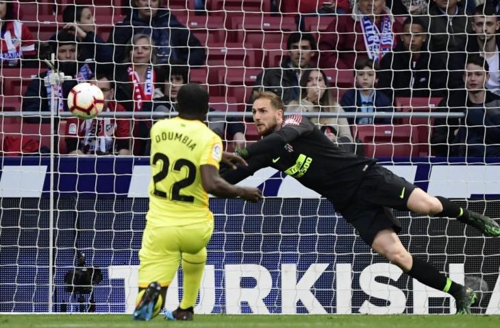 Kiper Atletico Madrid, Jan Oblak berniat untuk hengkang musim mendatang. [JAVIER SORIANO / AFP]