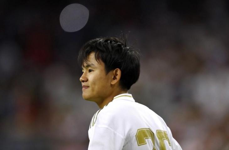 Takefusa Kubo yang dijuluki Messi dari Jepang melakoni debut bersama Real Madrid di ajang ICC yang dihelat di Singapura, Minggu (21/7/2019). [AARON M. SPRECHER / AFP]