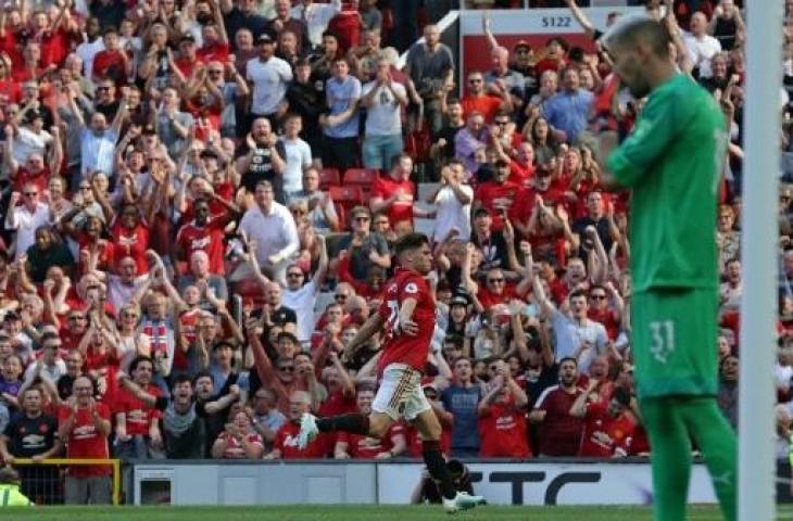 Selebrasi winger Manchester United, Daniel James, usai mencetak gol ke gawang Crystal Palace pada pekan ketiga Liga Primer Inggris di Old Trafford, Sabtu (24/8/2019) malam WIB. (LINDSEY PARNABY / AFP)