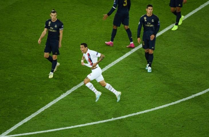 Pemain Paris Saint Germain, Angel Di Maria melakukan selebrasi usai cetak gol ke gawang Real Madrid, Kamis (19/9/2019) dini hari tadi. Pada laga Liga Champions itu PSG menang telak 3-0. [CHRISTOPHE ARCHAMBAULT / AFP]