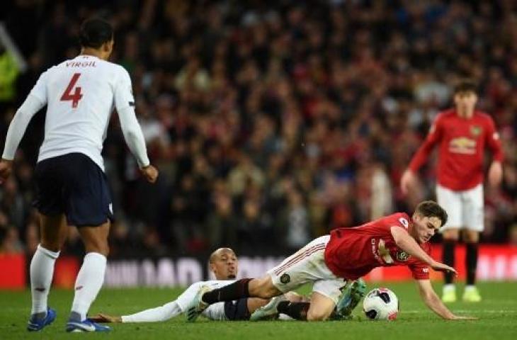 Suasana pertandingan antara Manchester United vs Liverpool di pekan kesembilan Liga Primer Inggris. (OLI SCARFF / AFP)