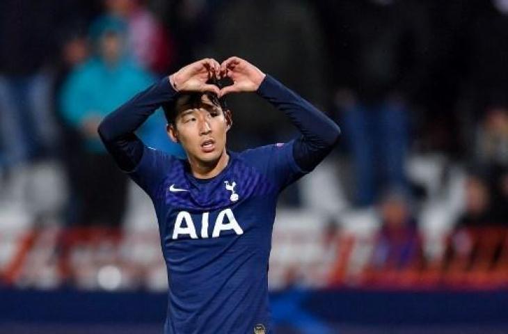 Selebrasi pemain Tottenham Hotspur, Son Heung-Min usai mencetak gol ke gawang Red Star Belgrade di Liga Champions. (ANDREJ ISAKOVIC / AFP)