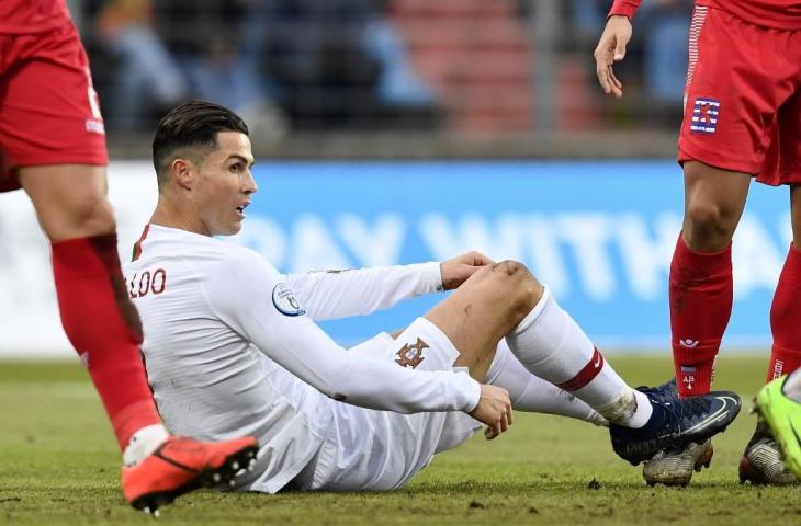 Cristiano Ronaldo saat melakoni laga Portugal kontra Luxemburg, pada lanjutan Kualifikasi Piala Eropa 2020, Senin (18/11/2019). [JOHN THYS / AFP]