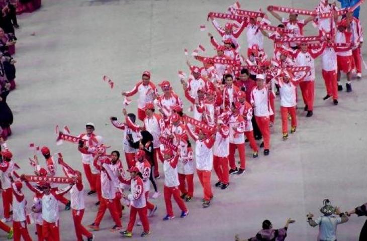 Kontingen Indonesia melakukan defile dalam pembukaan SEA Games 2019 di Philippine Arena, Bulacan, Filipina, Sabtu (30/11). [ANTARA FOTO/Nyoman Budhiana]