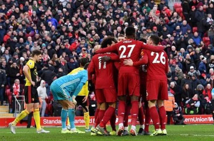 Selebrasi pemain Liverpool usai Mohamed Salah membobol gawang Watford. (PAUL ELLIS / AFP)