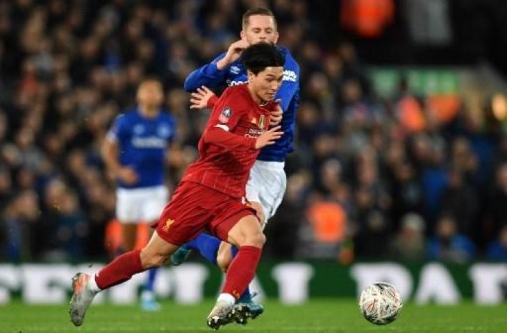 Takumi Minamino melakukan debut bersama Liverpool saat mengalahkan Everton di babak ketiga Piala FA. (PAUL ELLIS / AFP)