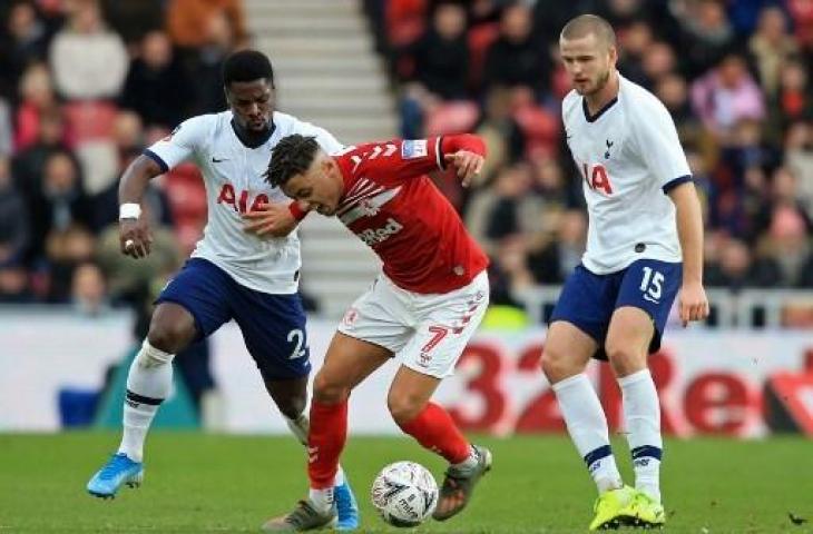 Tottenham Hotspur berhak lolos ke babak keempat Piala FA usai menundukkan Middlesbrough 2-1. (LINDSEY PARNABY / AFP)