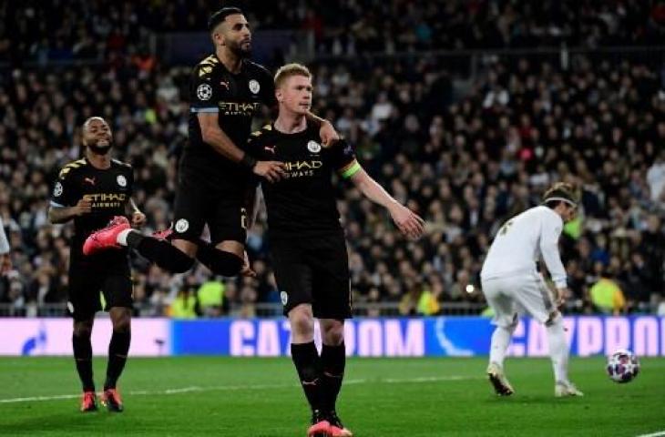 Para pemain Manchester City merayakan gol Kevin De Bruyne ke gawang Real Madrid. (JAVIER SORIANO / AFP)