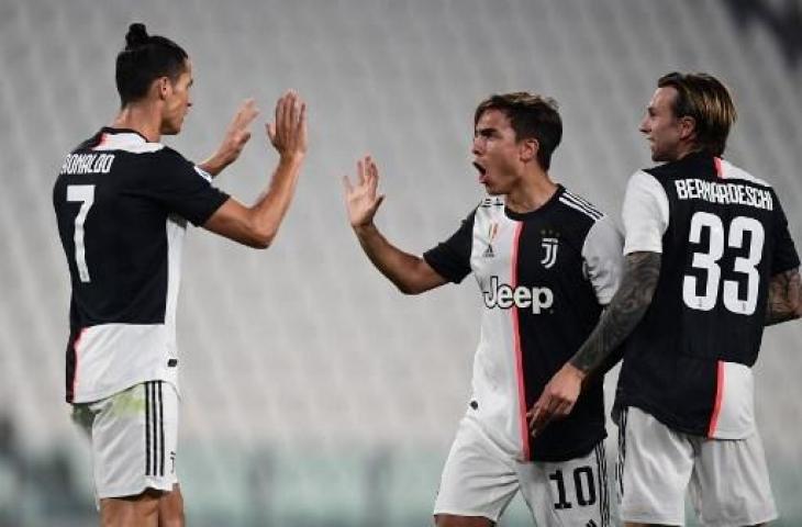 Cristiano Ronaldo dan Paulo Dybala. (Miguel Medina/AFP).