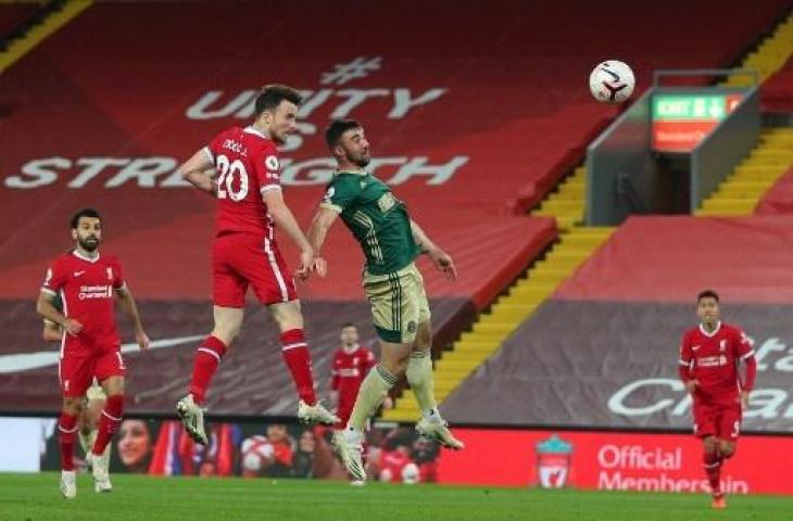 Aksi striker Liverpool, Diogo Jota saat mencetak gol ke gawang Sheffield United. (PETER BYRNE / POOL / AFP)