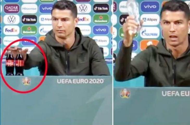 Aksi Cristiano Ronaldo menyingkirkan botol Coca-cola untuk digantikan air mineral dalam konferensi pers Euro 2020. [Tangkapan layar Yahoo]