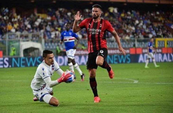 Selebari Olivier Giroud usai cetak gol buat AC Milan ke gawang Cagliari di laga pekan kedua Serie A 2021/2022. (MIGUEL MEDINA / AFP)