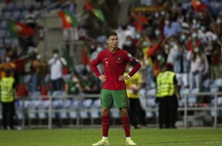 Cristiano Ronaldo saat memperkuat Timnas Portugal. (CARLOS COSTA / AFP)