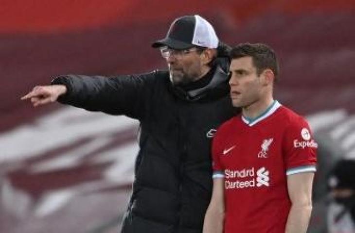 Jurgen Klopp dan James Milner. (Laurence Griffiths / POOL / AFP)