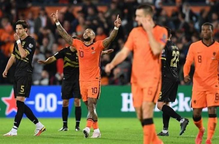 Memphis Depay cetak gol saat Belanda mengalahkan Gibraltar 6-0 dalam lanjutan Kualifikasi Piala Dunia 2022. (JOHN THYS / AFP)