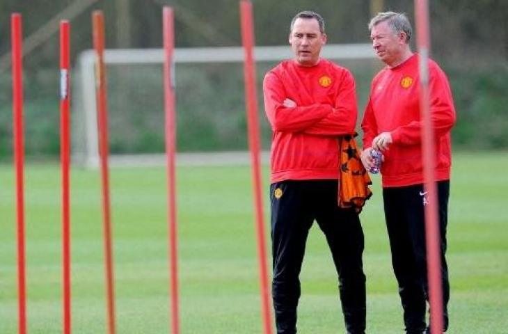 Rene Meulensteen bersama Sir Alex Ferguson di Manchester United. (Paul Ellis/AFP)