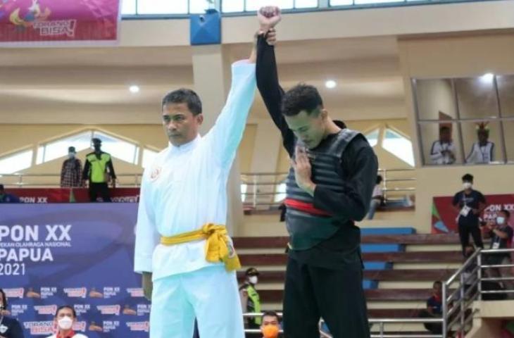 Pesilat Khoirudin Mustakim berhasil menyumbangkan medali emas bagi Jawa Tengah (Jateng) di (PON) XX. (Antara/ Muhammad Zulfikar)