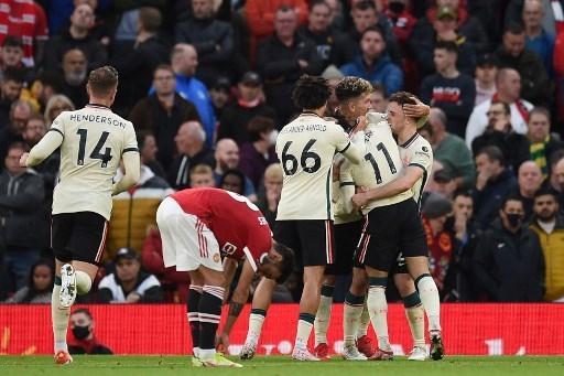 Liverpool bantai Manchester United di Old Trafford dalam lanjutan pekan ke-9 Liga Inggris, Minggu (24/10/2021). (Oli SCARFF / AFP)