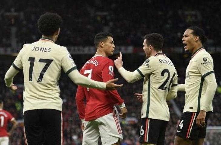 Liverpool bantai Manchester United di Old Trafford dalam lanjutan pekan ke-9 Liga Inggris, Minggu (24/10/2021). (Oli SCARFF / AFP)