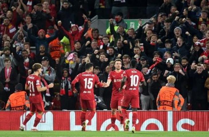 Selebrasi penyerang Liverpool, Diogo Jota usai bobol gawang Atletico Madrid di Liga Champions. (OLI SCARFF / AFP)