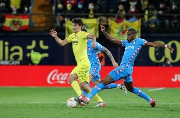 Potret pertandingan Villarreal vs Atletico Madrid yang berakhir imbang 2-2. (JOSE JORDAN / AFP)